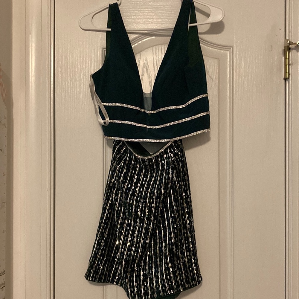 Two piece cocktail ware, only worn once dark green with with rhinestones size 4